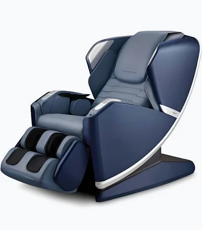 Compact navy and slate massage chair with L-shaped frame and footrest